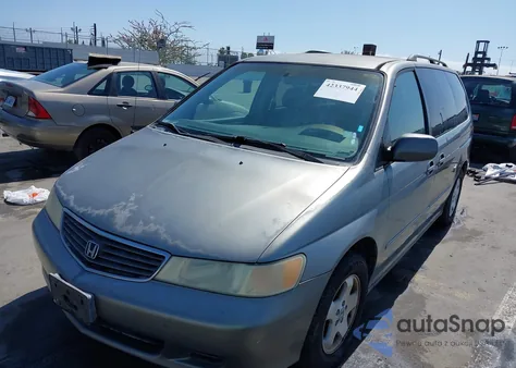 2001 Honda Odyssey Ex z USA, uszkodzony, nr VIN 2HKRL18641H504729